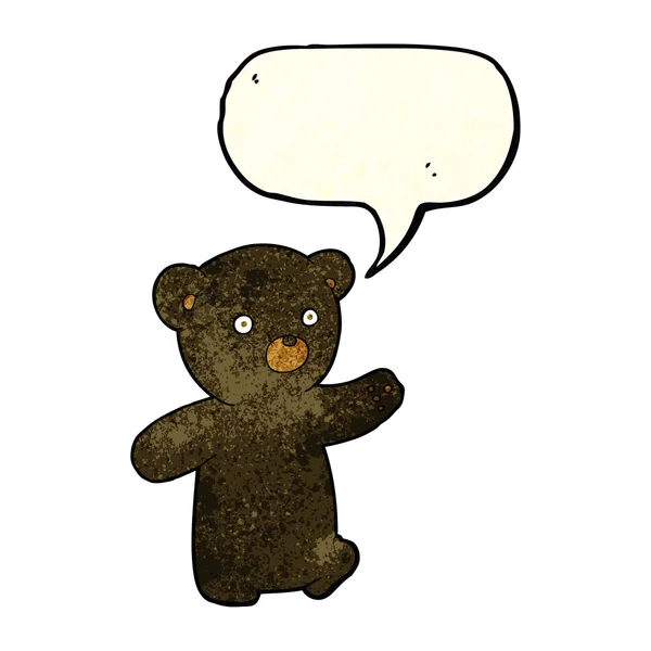 Dibujos animados negro oso cachorro con el habla burbuja — Vector de stock