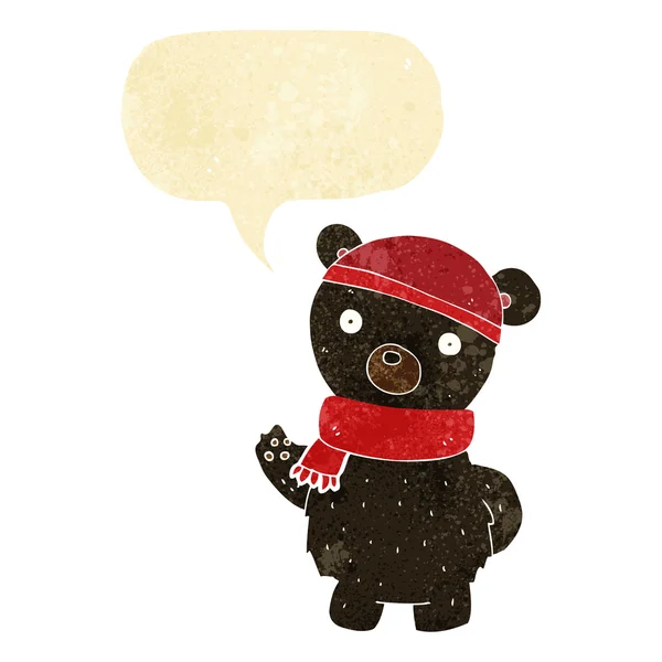 Cartoon black bear in winter hat and scarf with speech bubble — Stock Vector