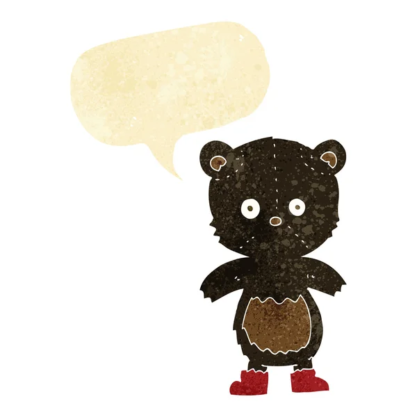 Desenho animado filhote de urso preto com bolha de fala — Vetor de Stock