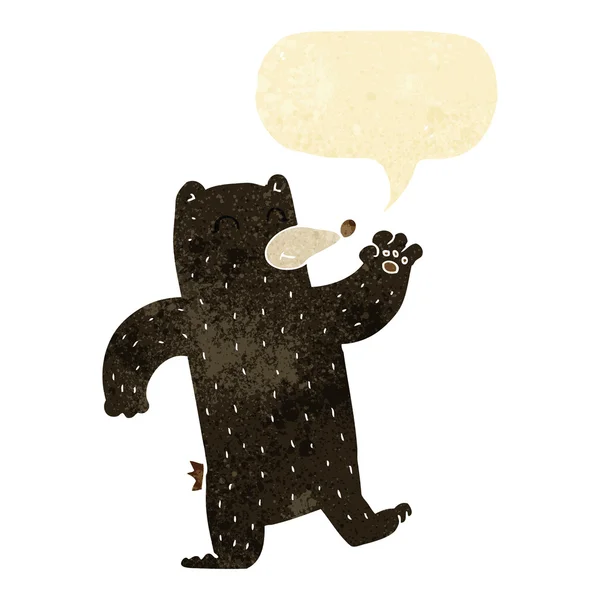 Cartone animato agitando orso nero con bolla discorso — Vettoriale Stock