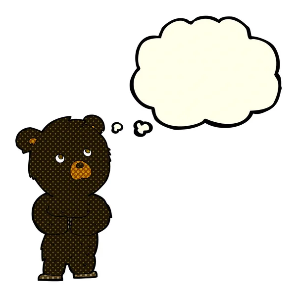 Cartoon black bear cub with thought bubble — Stock Vector