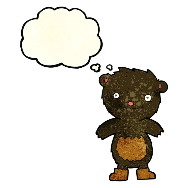 Desenho animado ursinho preto usando botas com bolha de pensamento — Vetor de Stock