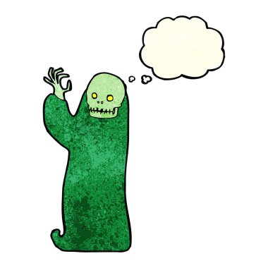 Düşünce baloncuğuyla cadılar bayramı hortlağını sallayan çizgi film.