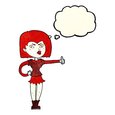 Çizgi filmdeki vampir kız düşünce baloncuğuyla başparmak işareti yapıyor.