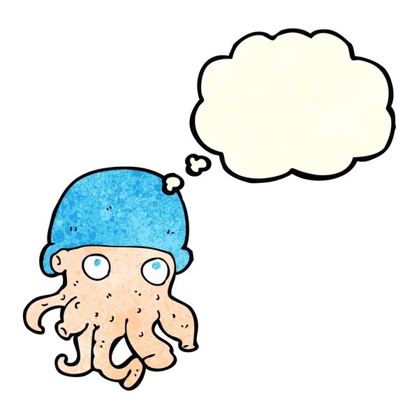 Dibujos animados cabeza alienígena usando sombrero con burbuja de pensamiento — Vector de stock