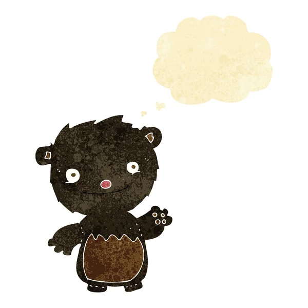 Cartoon viftande black bear cub med trodde bubble — Stock vektor