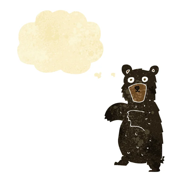 Γελοιογραφία μαύρη αρκούδα με σκέψη φούσκα — Διανυσματικό Αρχείο