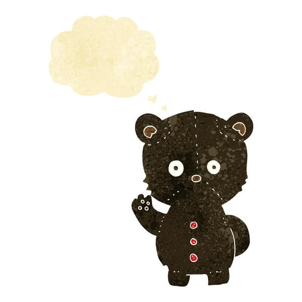 Desenho animado filhote de urso preto com bolha de pensamento — Vetor de Stock