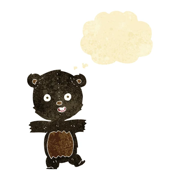 Desenho animado bonito urso preto filhote com bolha pensamento — Vetor de Stock