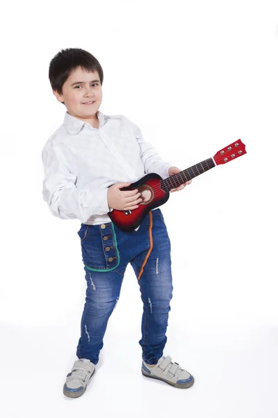 Jeune musicien avec une petite guitare — Photo