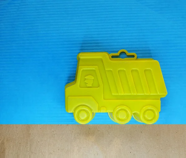 Childrens toy-sand mold in the form of a truck — Stock Photo, Image