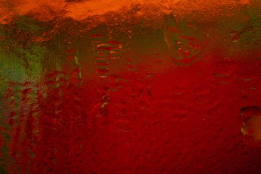 Islak renk dokusu. Eğimli soyut dokular. Karanlık arka plan. Seçici yumuşak odak