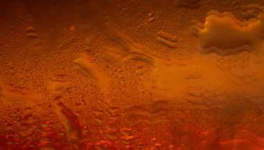 Islak renk dokusu. Eğimli soyut dokular. Damlalarla soyut bir arkaplan. Yumuşak odak