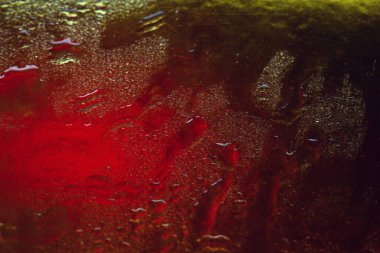 Renkli doku. Soyut ıslak doku ve gradyan. Damlalarla soyut bir arkaplan. Seçici yumuşak odak