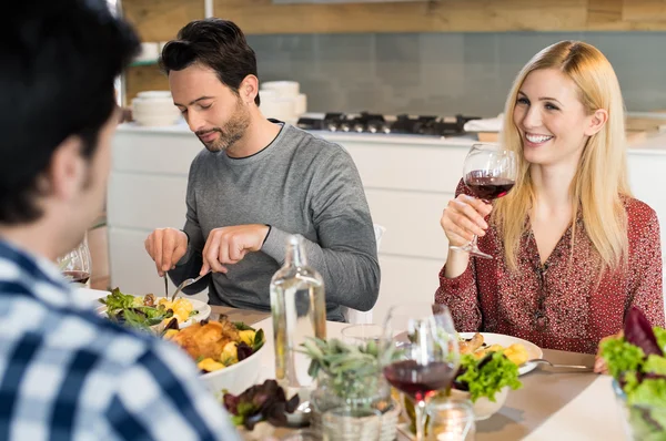 Happy friends eating together — Stock Photo, Image