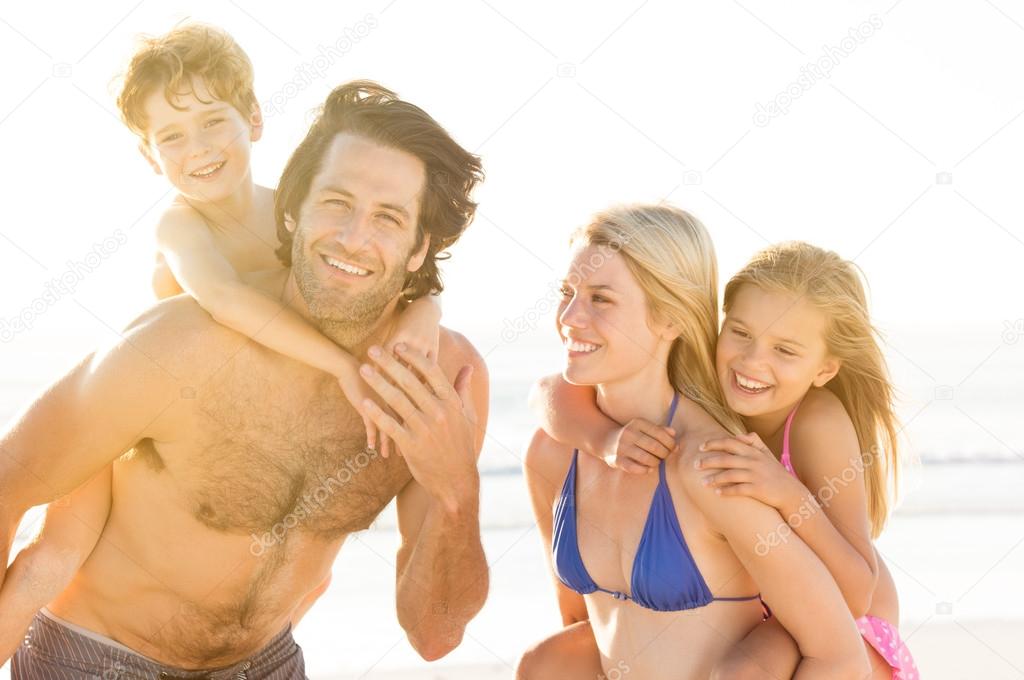 Parents with children at beach