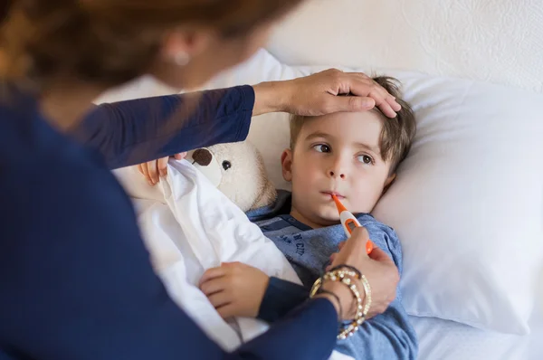 Boy measuring fever — Stock Photo, Image