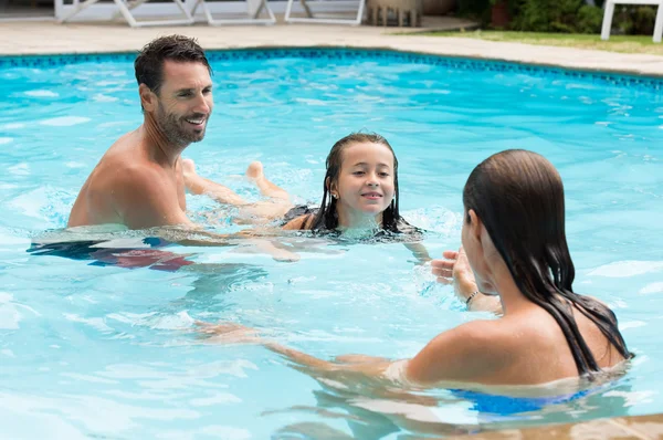 Young girl learning to swim