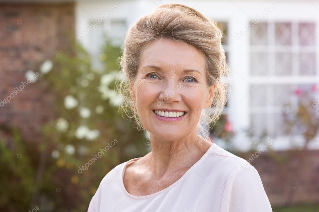 Smiling senior woman Stock Photo by ©ridofranz 108996512