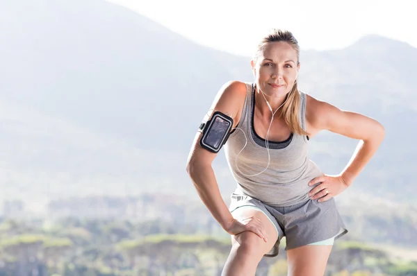 Mature woman jogging — Stock Photo, Image