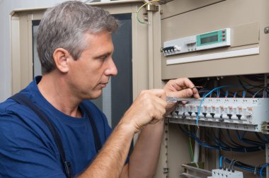 Electrician Repairing A Circuit Breaker clipart