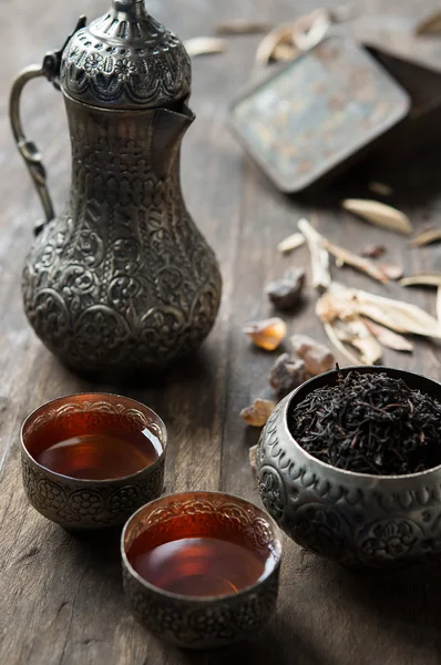 Arabic tea service on rustic table — Stock Photo, Image