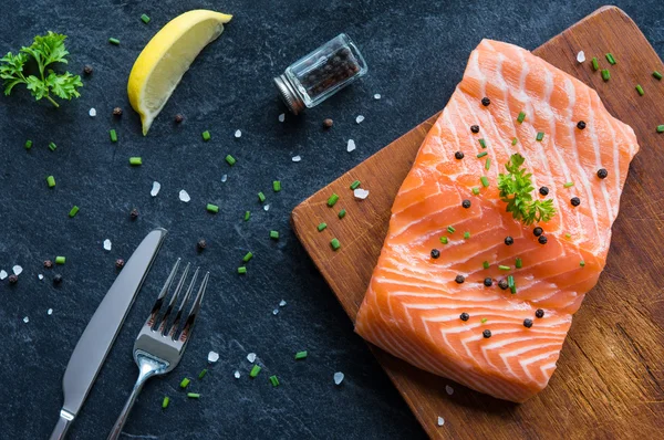 Fresh salmon fillet with pepper — Stock Photo, Image
