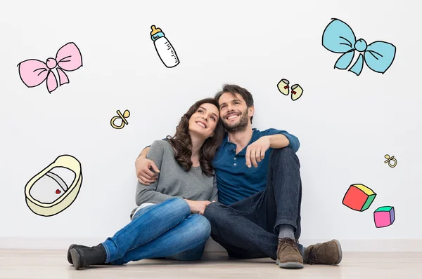 Pareja soñando con bebé — Foto de Stock