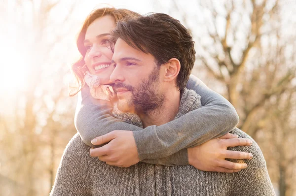 Happy couple hugging outdoor — Stock Photo, Image