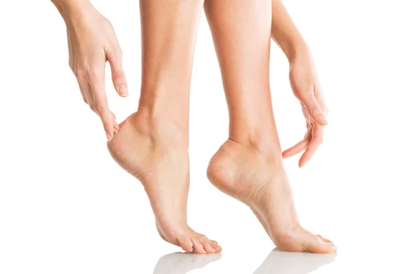 Woman  touching her feet