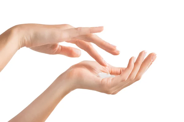 Female hands applying cream — Stock Photo, Image