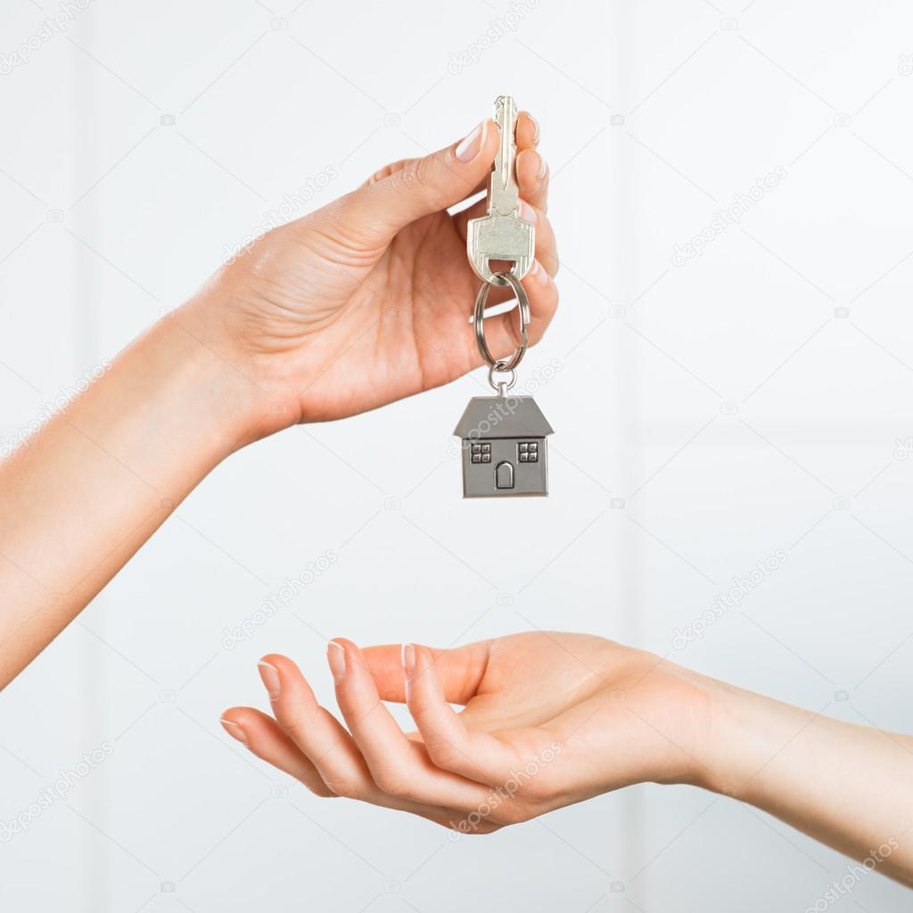 Woman receiving house key