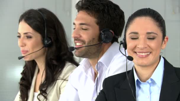 Woman with colleagues at call center — Stok video