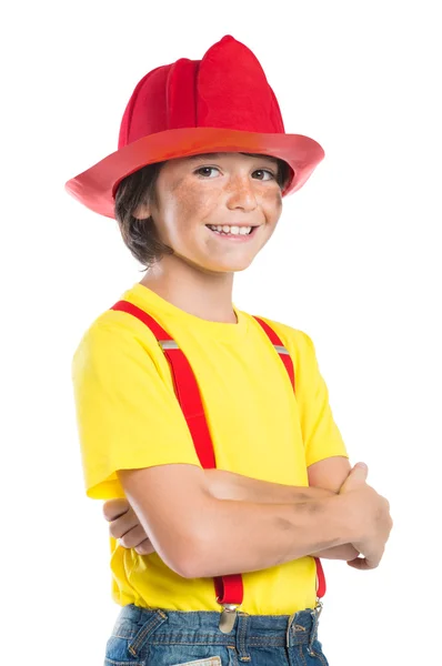 Jonge brandweerman jongen glimlachen — Stockfoto