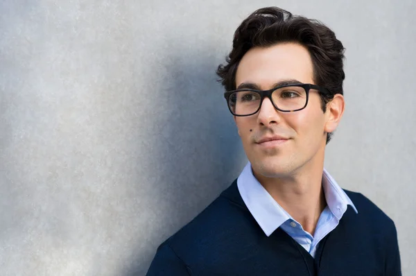 Thinking businessman wearing glasses — Stock Photo, Image