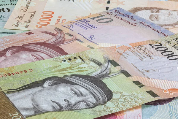 Close up to the currency of the south American country Venezuela. High inflation and weak economy increases the denomination of the banknotes. Bolivares or Bolivar money of the republic Venezuela