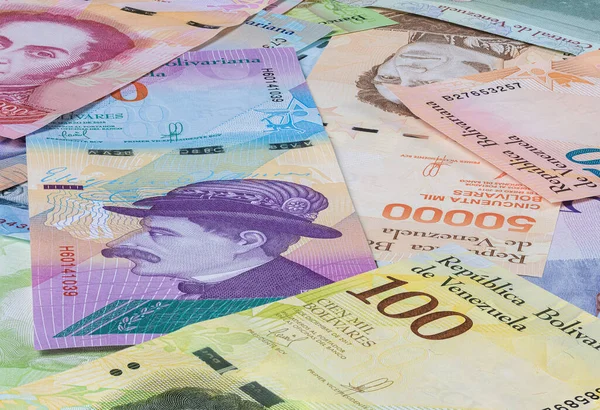 Close up to the currency of the south American country Venezuela. High inflation and weak economy increases the denomination of the banknotes. Bolivares or Bolivar money of the republic Venezuela