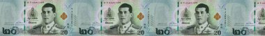 20 Tayland baht banknotluk bir sıranın makro fotoğrafçılığı. Tayland banknotlarının detaylarını detaylıca inceledim. Tayland 'ın parası. 20 Baht, Tayland 'ın yeni kralının portresiyle. 