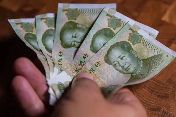 Male Hand Holds Fan Renminbi Chinese Yuan Abbreviated Rmb Banknote — Stock Photo, Image