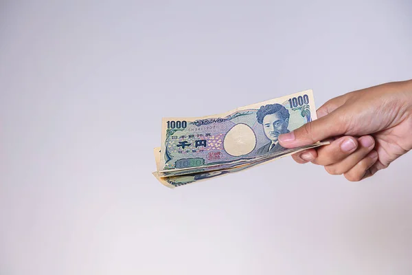 Kvinnliga Händer Visar Japansk Yen Yen Japans Valuta Framsidan Sedlarna — Stockfoto