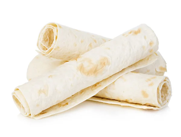 Tarwe ronde tortilla's close-up geïsoleerd op een witte achtergrond. Lavash. Stockfoto
