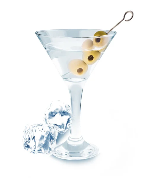 Delicious cocktail with olives and ice cubes in martini glass on a white background. — Stock Photo, Image