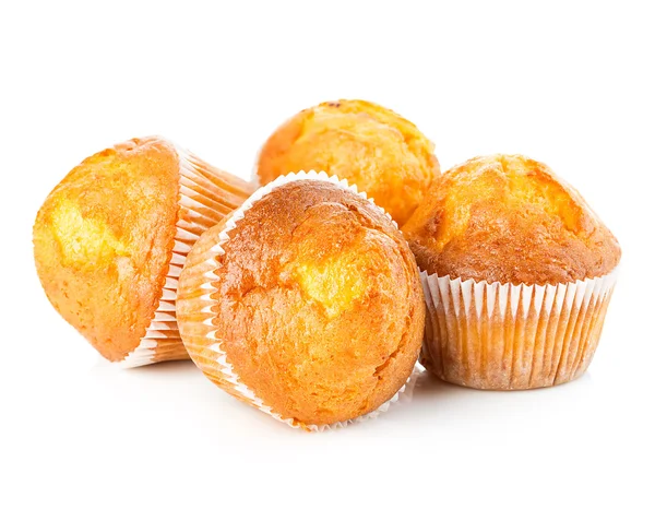 De délicieux muffins en gros plan isolés sur fond blanc . — Photo