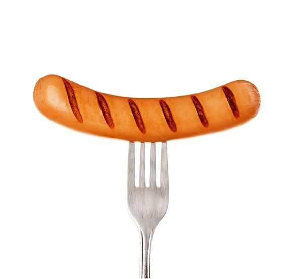 Grilled sausage on a fork — Stock Photo, Image