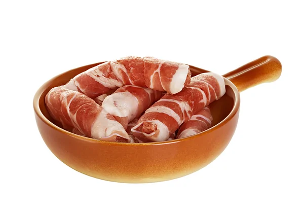 Sausages wrapped in bacon in a frying pan, chevapchichi on white background — Stock Photo, Image