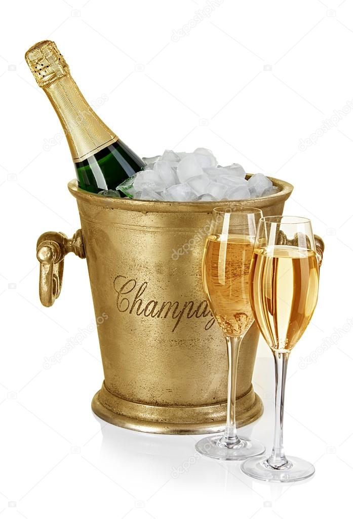 Bottle of champagne  in ice bucket with stemware isolated on white background