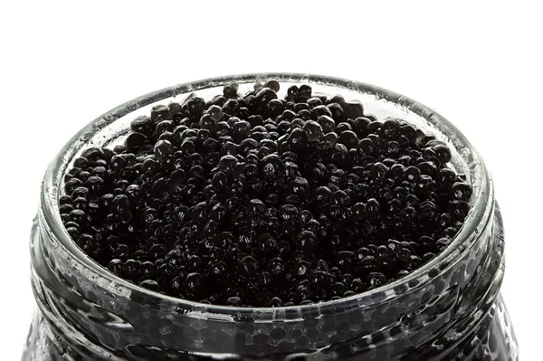 Caviar em um frasco de vidro isolado no fundo branco — Fotografia de Stock