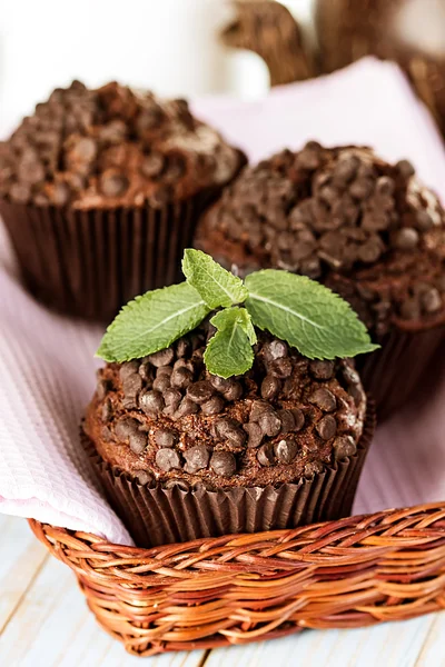 Homemade chocolate muffins in paper cupcake holder — Stock Photo, Image