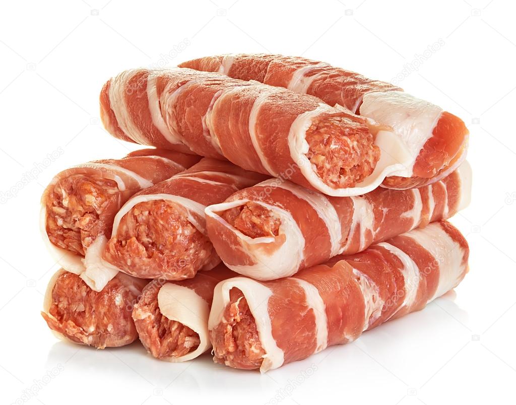 Sausages wrapped in bacon, chevapchichi isolated on white background