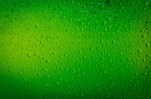 Gotas de agua de textura en la botella de cerveza. Fondo de cerveza — Foto de Stock